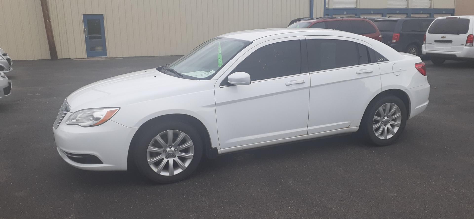 2012 Chrysler 200 Touring (1C3CCBBB9CN) with an 2.4L L4 DOHC 16V engine, 6-Speed Automatic transmission, located at 2015 Cambell Street, Rapid City, SD, 57701, (605) 342-8326, 44.066433, -103.191772 - CARFAX AVAILABLE - Photo#1